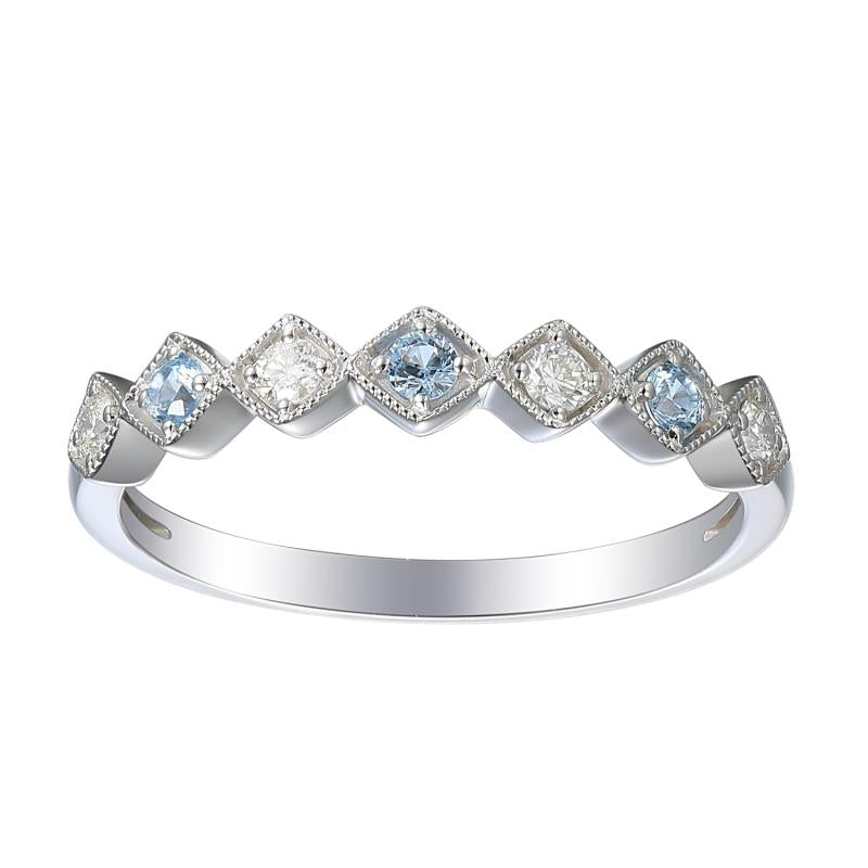 טבעת כסף אלגנטית עם אבני חן כחולות ושקופות לסירוגין