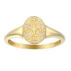 טבעת זהב עם מרכז אובלי מונח פאווה המאפיין עיצוב של כוכב.